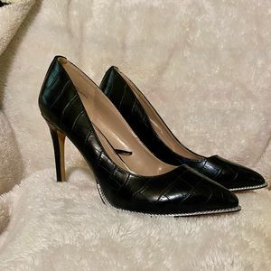 Black heels never worn with silver trim.